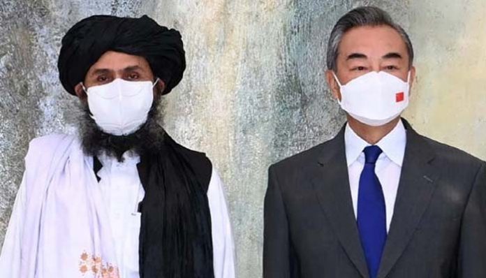 Chinese Foreign Minister Wang Yi meets with Mullah Abdul Ghani Baradar