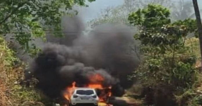 The car Kasargod was driving caught fire; The occupants of the car escaped unhurt