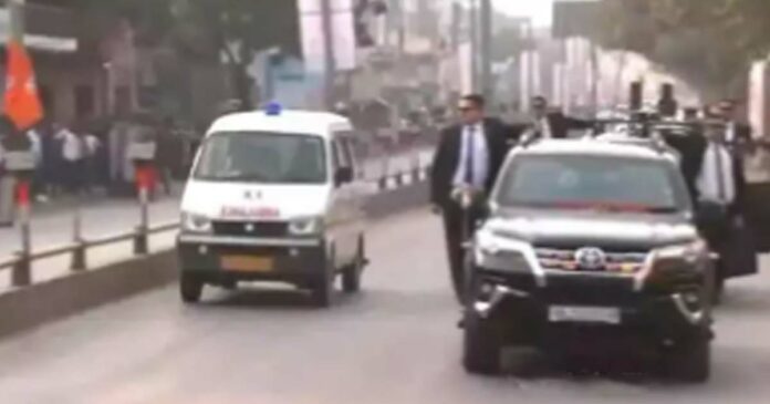 Prime Minister Narendra Modi stops his motorcade to make way for an ambulance during a road show in Varanasi