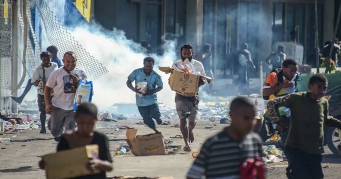 Eight dead in Papua New Guinea riots, arson: Nationwide police strike delays riot control