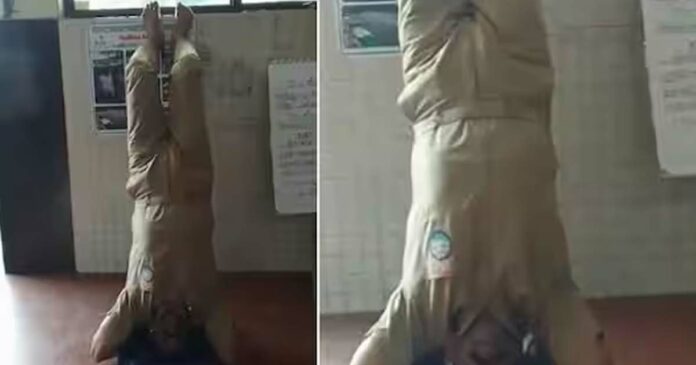 Not getting paid; KSRTC driver and BMS Employees Sangh district working president Jayakumar protested by hanging his head.